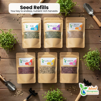 Seed refills on a wooden surface with gardening tools and microgreens.